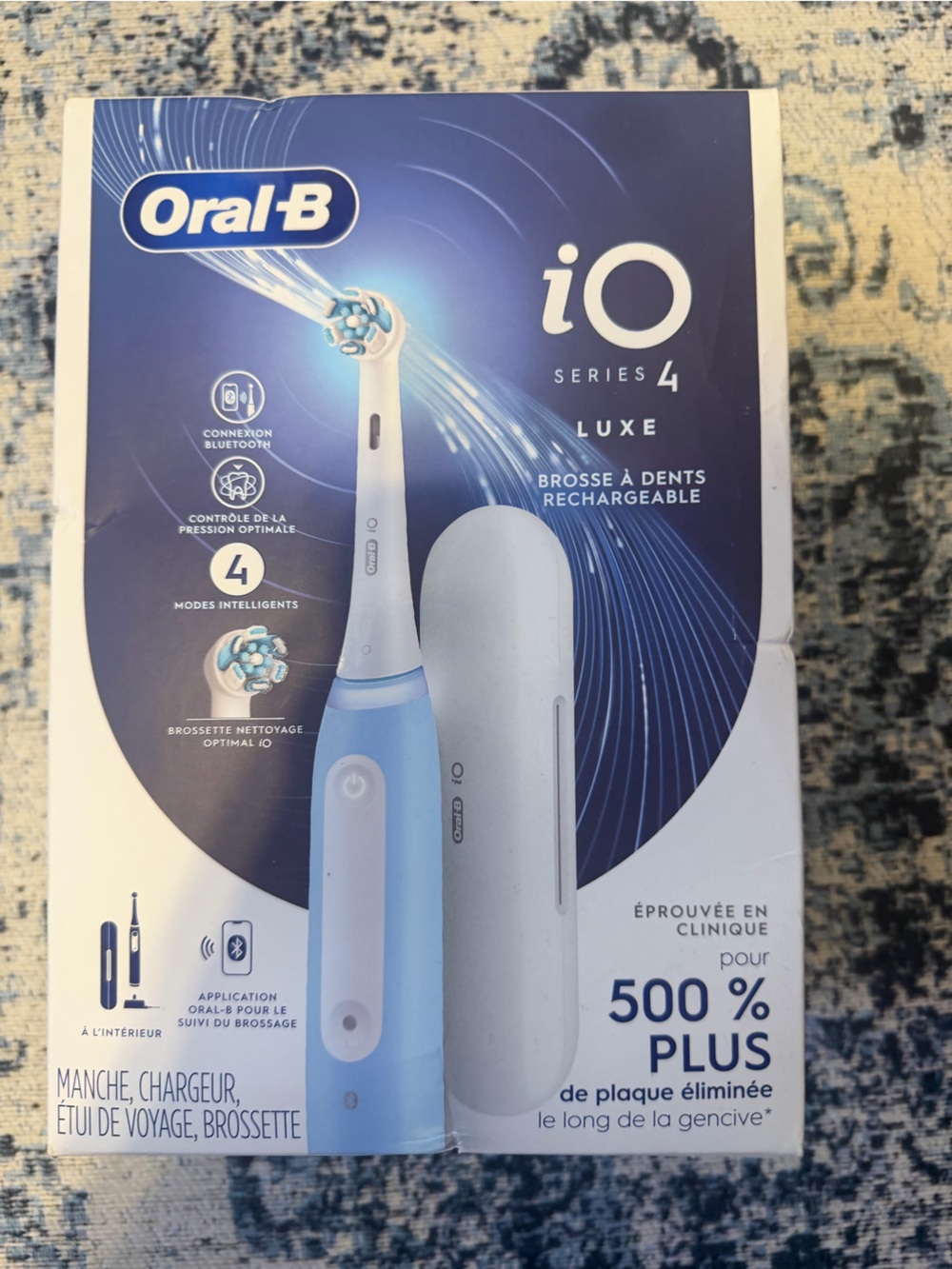 Oral‑B iO Series 4 Luxe Rechargeable Electric Toothbrush - Light Blue